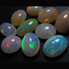 Ethiopian Opal really high quality Oval CABOCHON each pcs have amazing beautifull flashy fire size 6 -11 mm 10 pcs approx -- STUNNING QUALITY